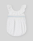 Blue and white romper with smocked details.