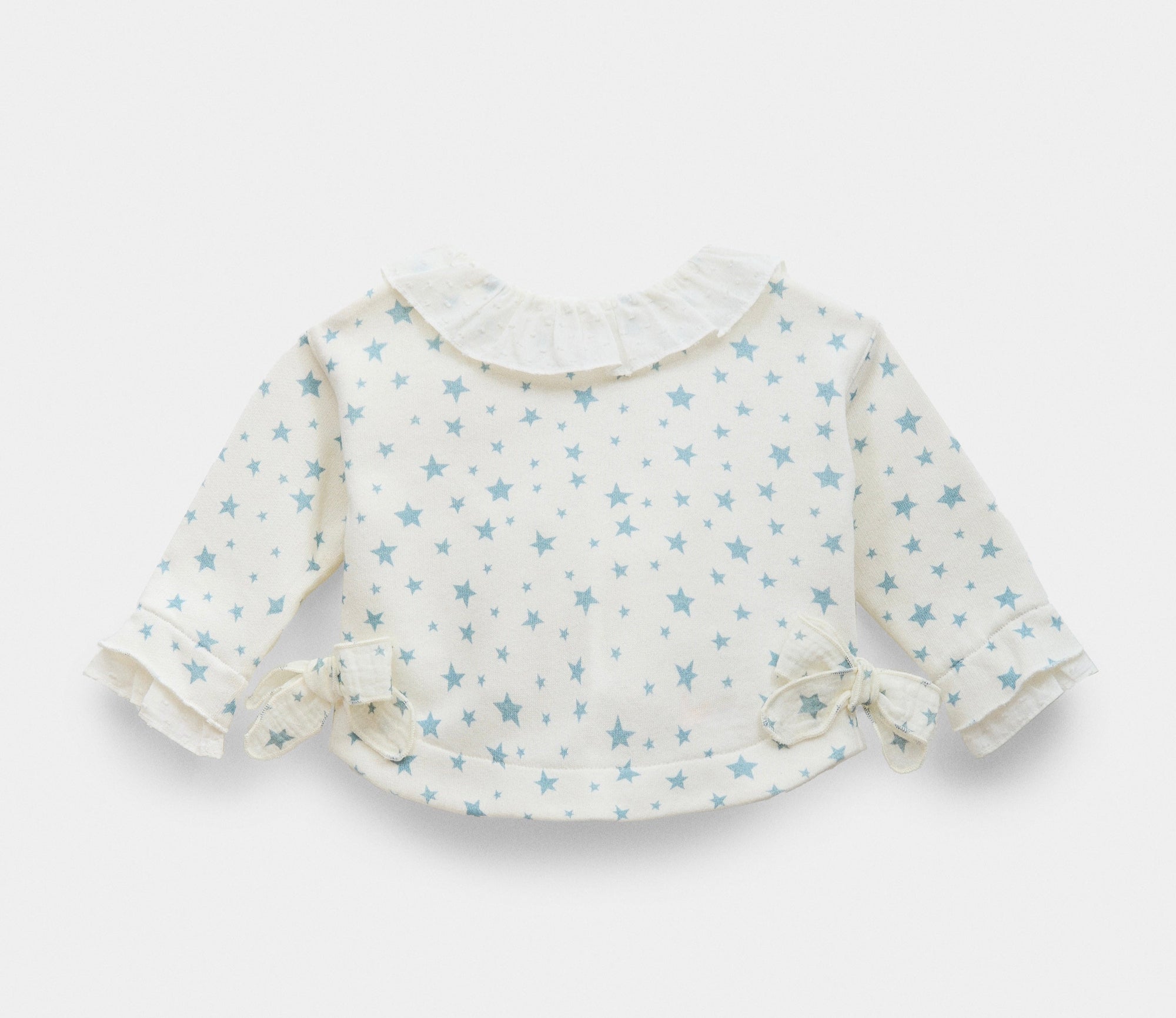Blouse with star print for babies