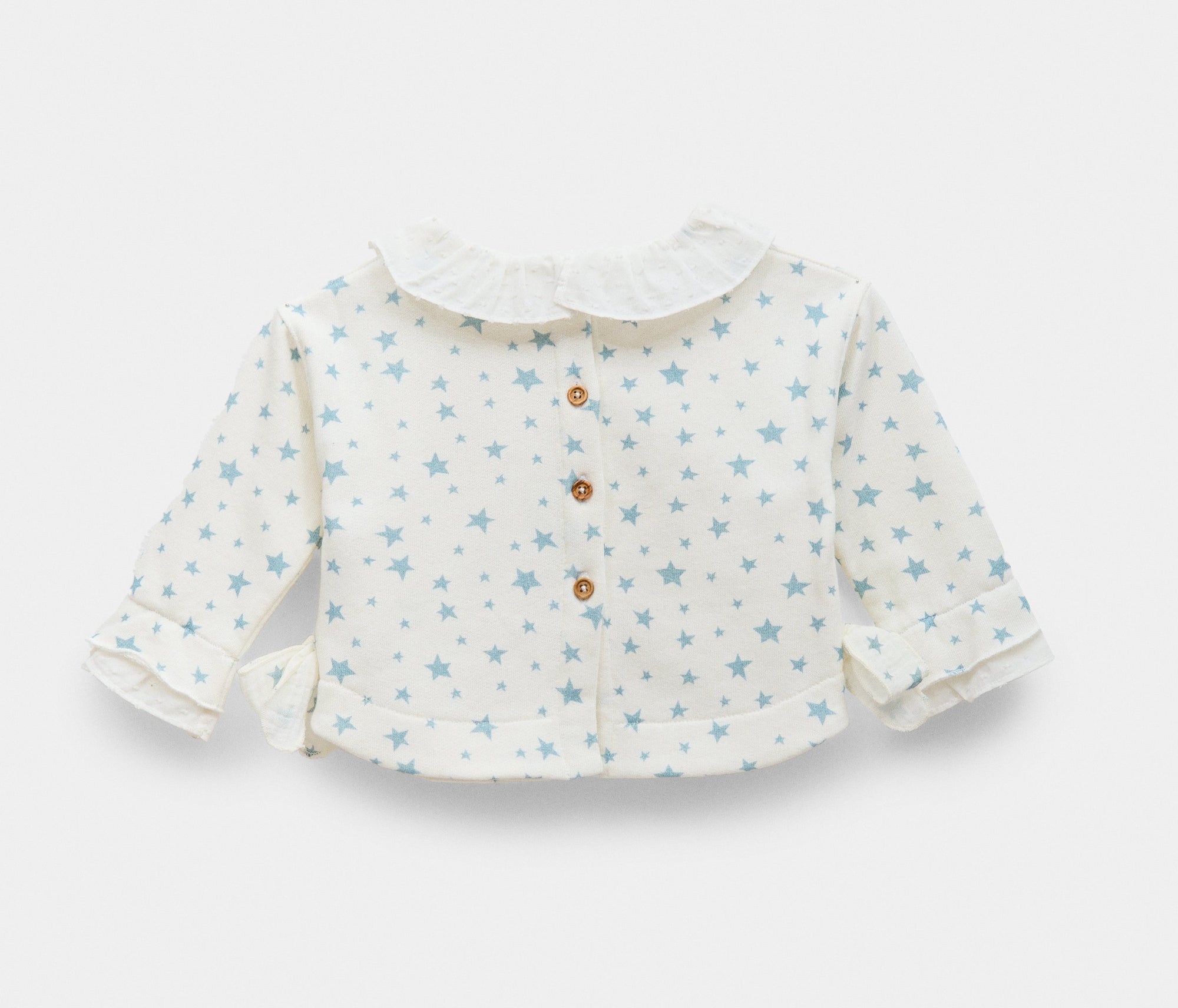 Blouse with star print for babies