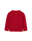 Red cable knit sweater on a white background
