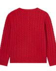 Red cable knit sweater on a white background