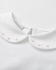 WHITE T-SHIRT WITH PINK COLLAR DETAILS