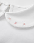 WHITE T-SHIRT WITH PINK COLLAR DETAILS