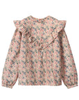 Floral blouse with ruffled shoulders on a white background