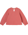Red sweatshirt with a white flower from MIBONBON