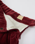 Burgundy velvet skirt with decorative elements