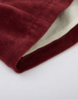 Burgundy velvet skirt with decorative elements