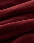 Burgundy velvet skirt with decorative elements