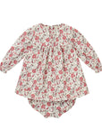 Floral baby outfit with long-sleeve top and bloomers on a white background