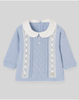 Knitted sweater with round neckline