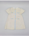 Chanel-inspired Blue Dress with gold metallic buttons