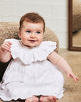 EMBROIDERED PLUMETI DRESS WITH RUFFLE BORDER