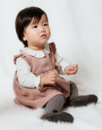 PINK CORDUROY PINAFORE WITH WHITE VIELLA