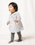 Blue viella dress with leaf print and pintucks