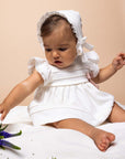 WHITE DRESS ECRU WITH PINK BOW