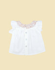 White blouse with pockets and pink flower print ruffle collar