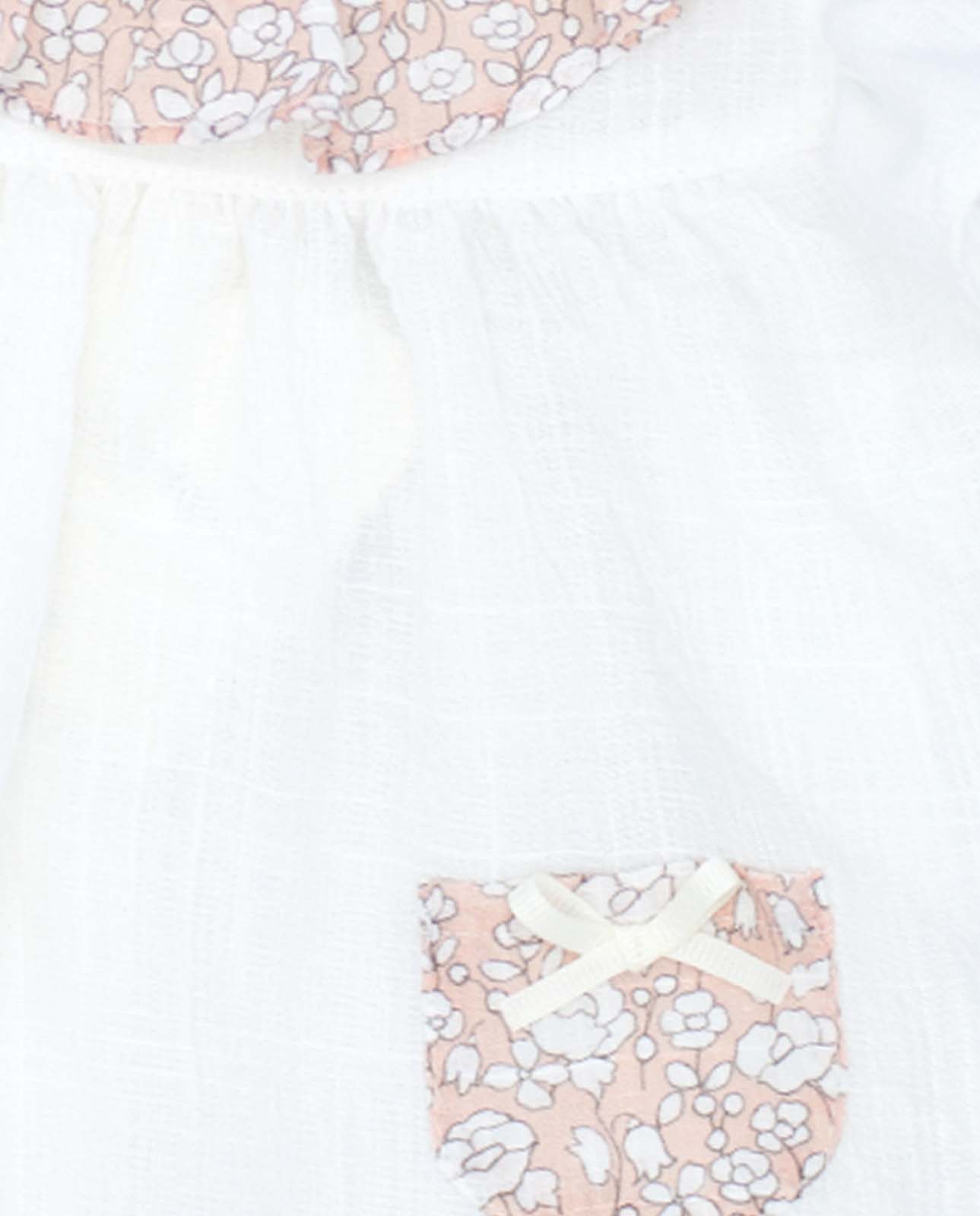 White blouse with pockets and pink flower print ruffle collar