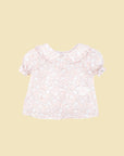Pink flower print blouse with puff sleeves and a collar