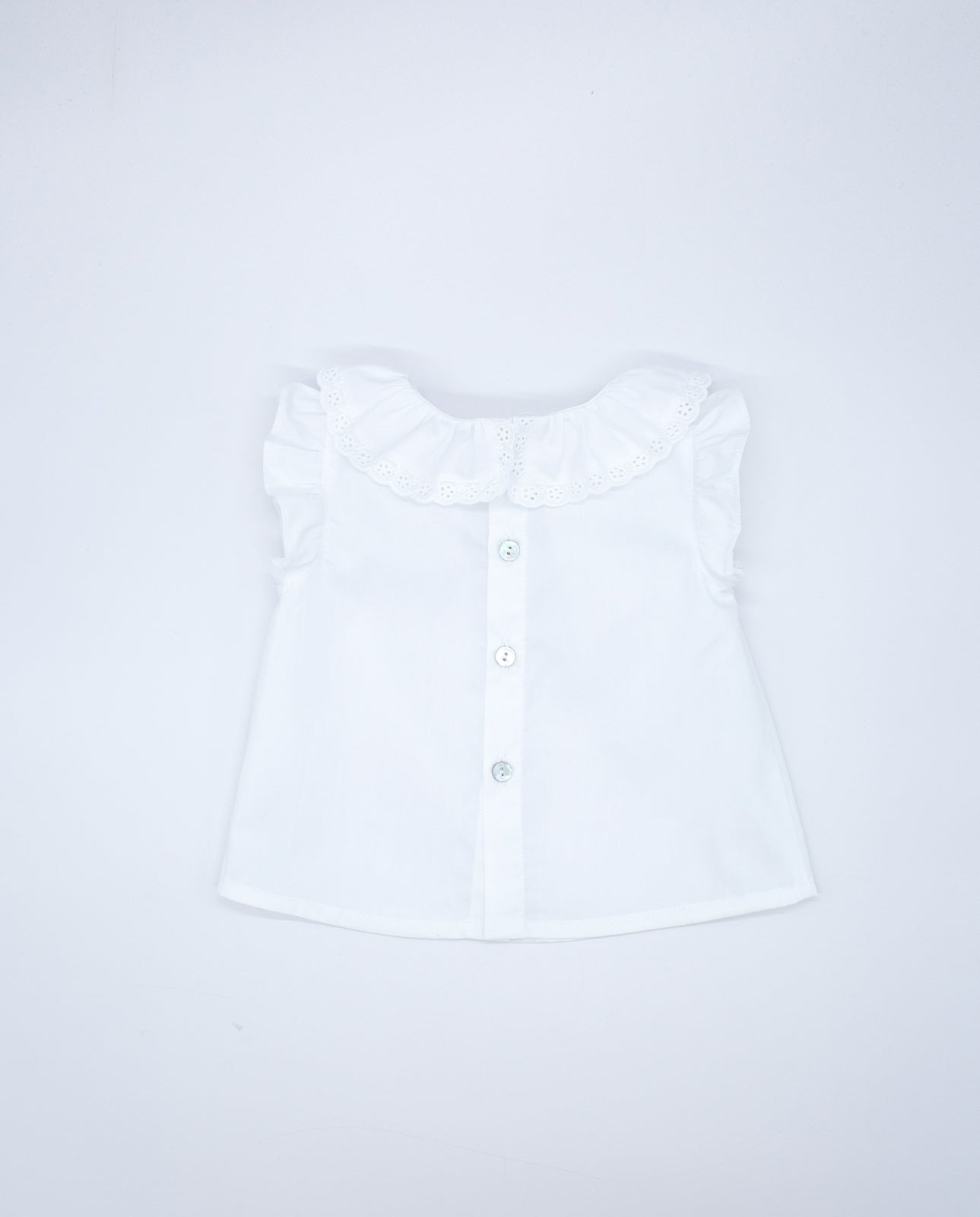 White poplin blouse with embroidered trim