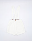 White linen shorts with suspenders