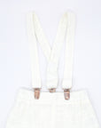 White linen shorts with suspenders