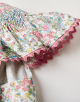 Smocked floral dress with Flutter sleeves