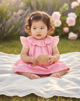 Asian baby in pink ruffle dress – Bonpoint summer style