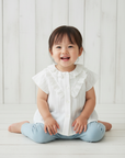 Asian Girl in White Ruffle Blouse Studio Photo