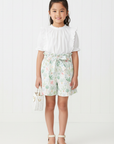 Girl in Tropical Shorts - Studio Shot