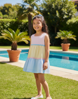 Lifestyle photo of Asian girl wearing color-block dress by pool