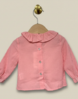 Pink Ruffle Blouse Back View on Beige Background