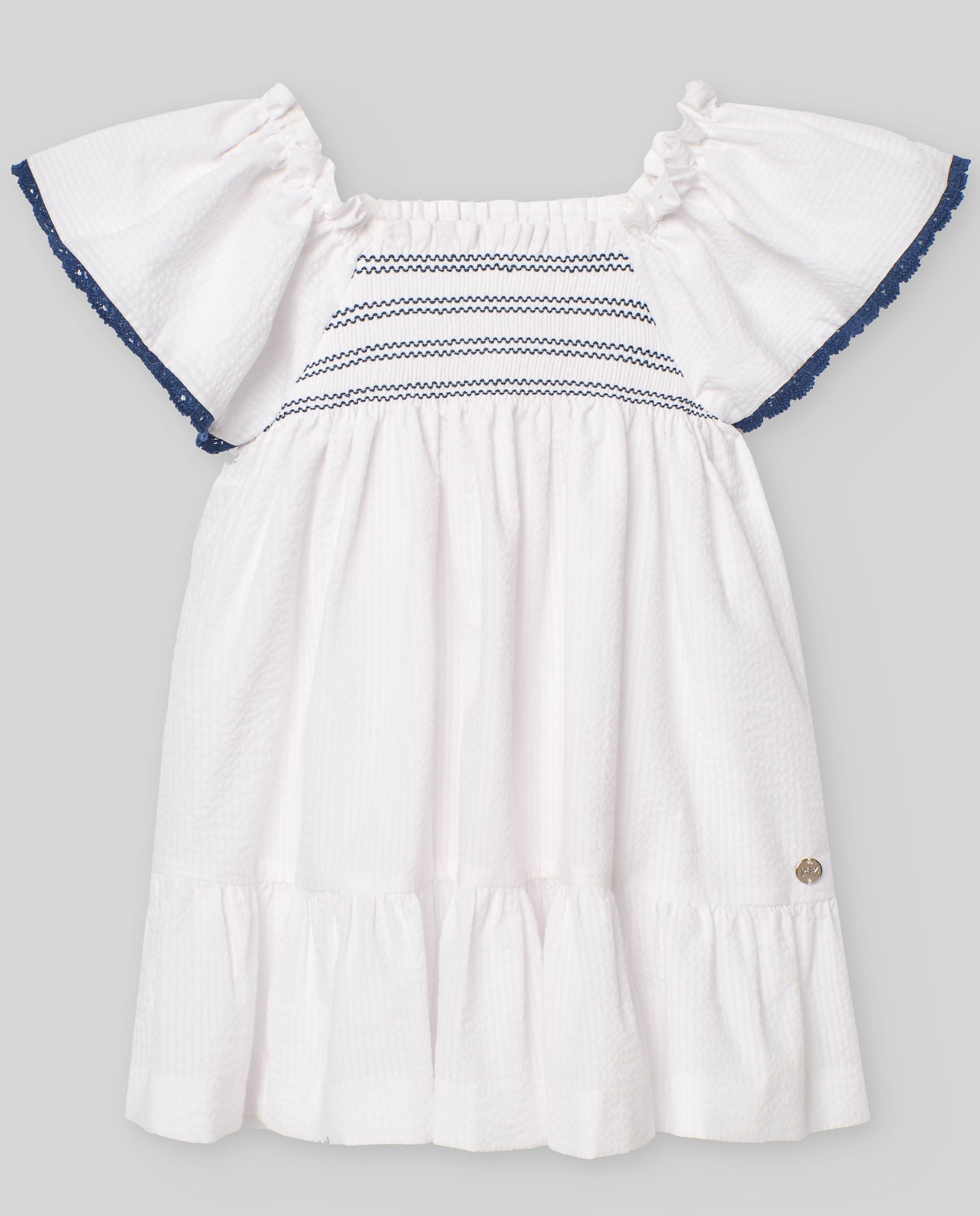 Girls&#39; dress with ruffled details