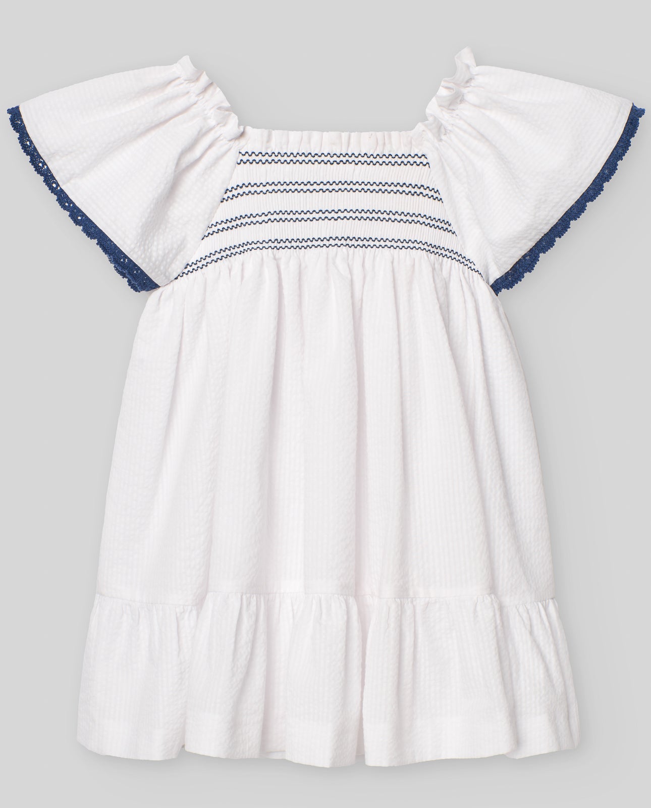 Girls&#39; dress with ruffled details