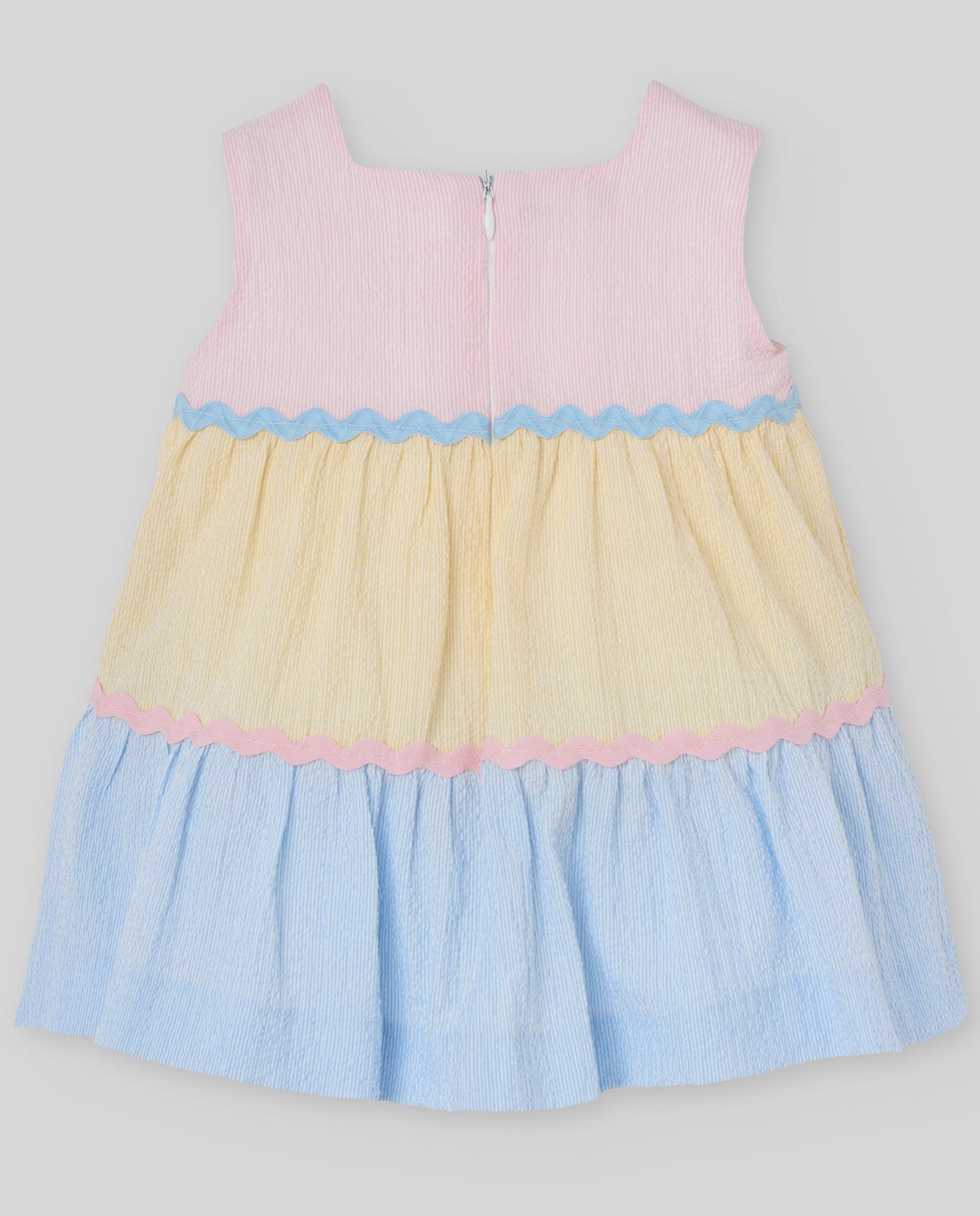 Seersucker dress featuring a wavy trim and flared skirt