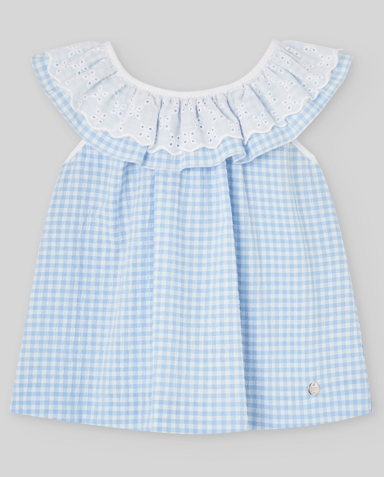 Girl's blouse with a gingham check pattern