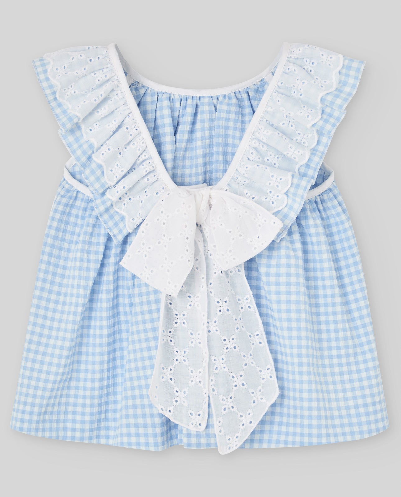 Girl's blouse with a gingham check pattern