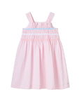 Dress for girl crafted in seersucker with a smocked bodice