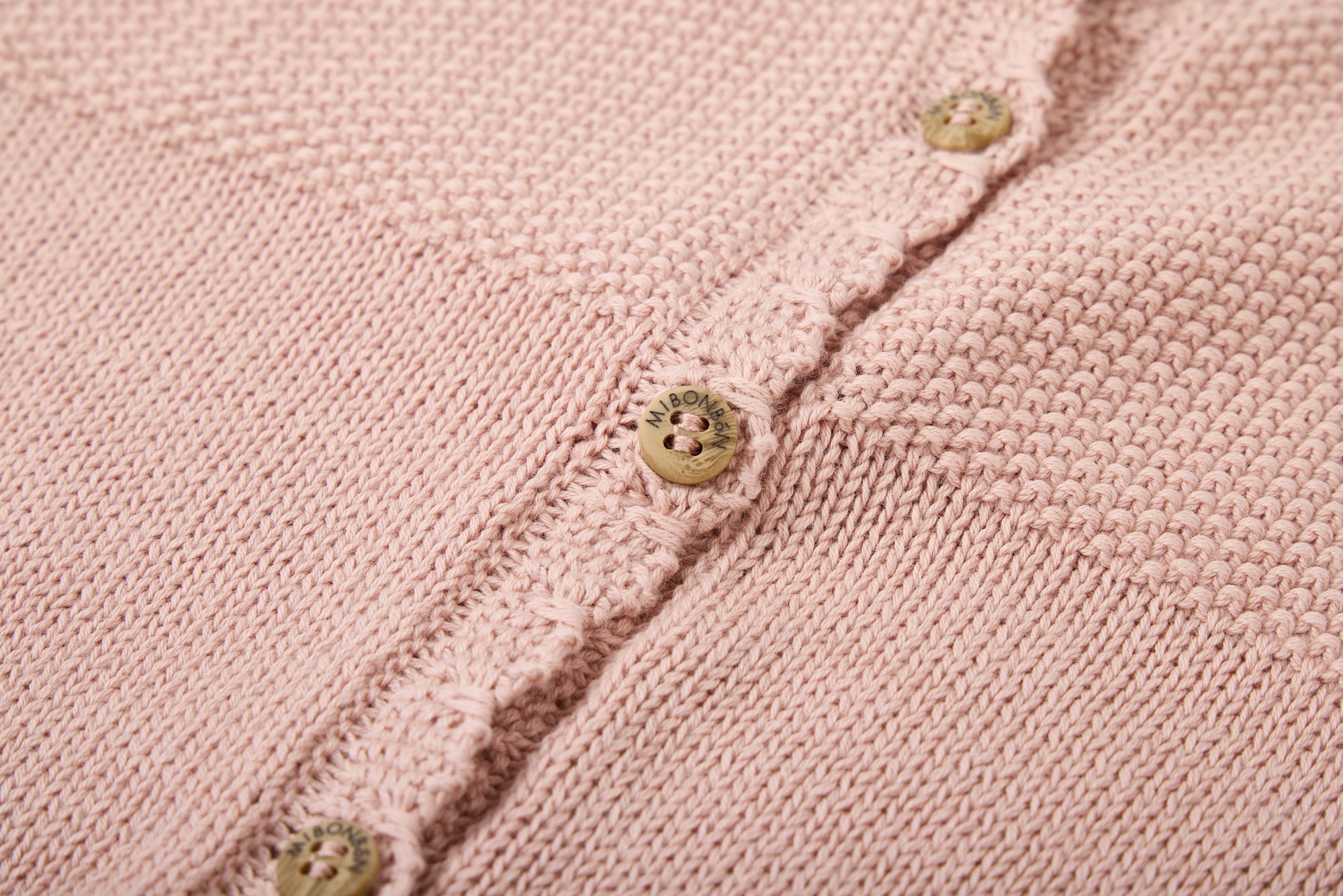 KNITTED PINK VEST. DESIGNED BY GIGI LEUNG