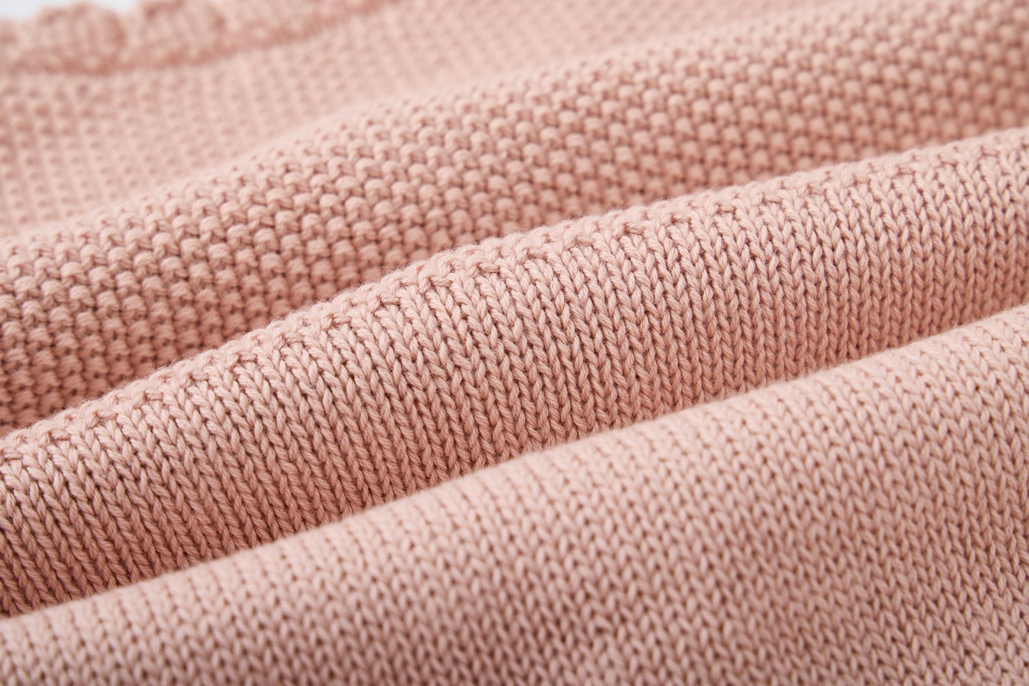 KNITTED PINK VEST. DESIGNED BY GIGI LEUNG