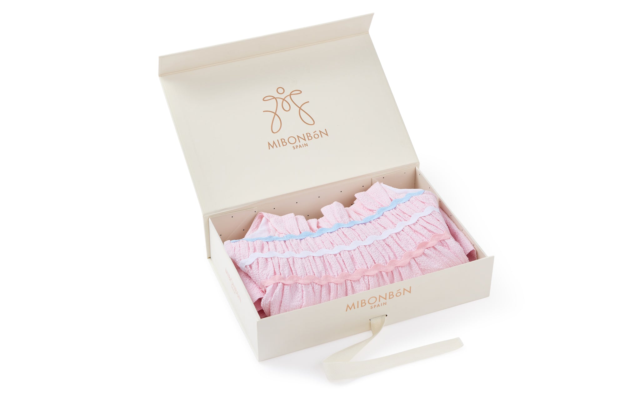 Dress for girl crafted in seersucker with a smocked bodice