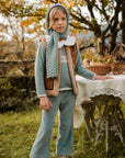 Long girl’s corduroy trousers in green
