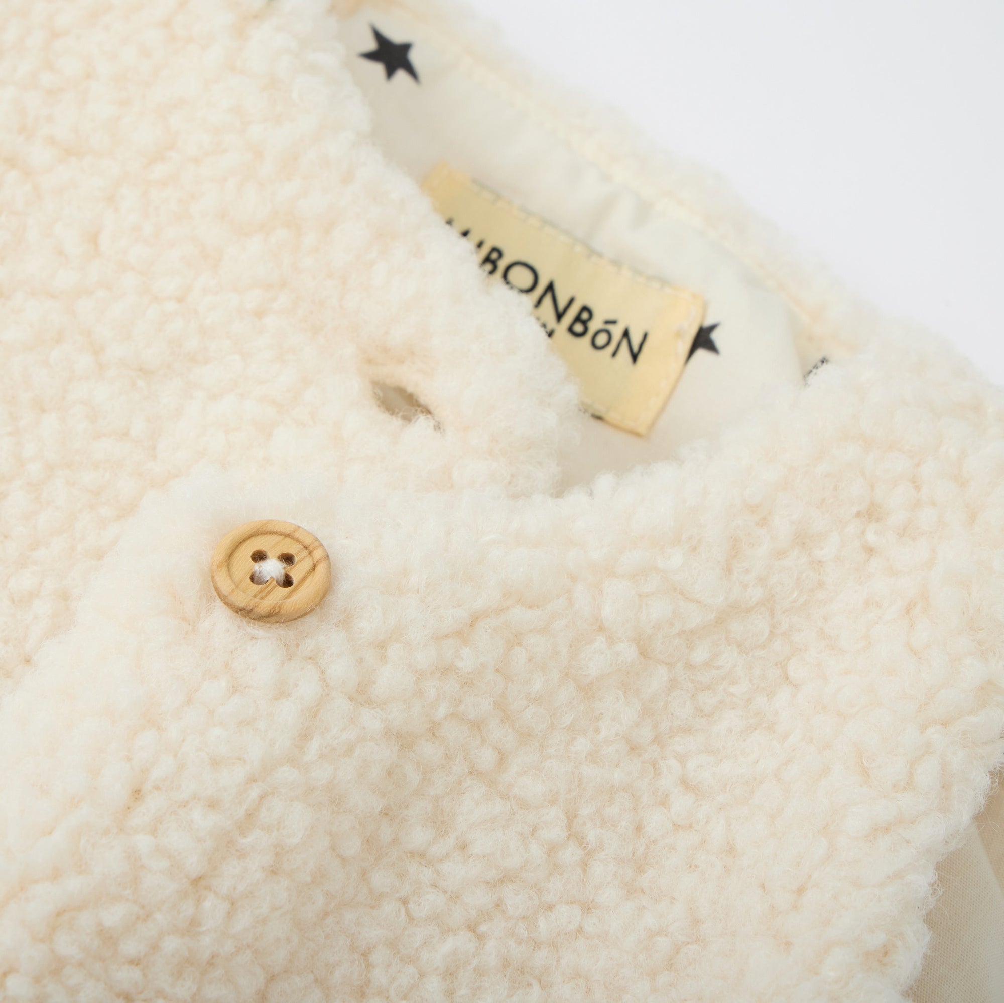 WHITE VEST FOR BABIES