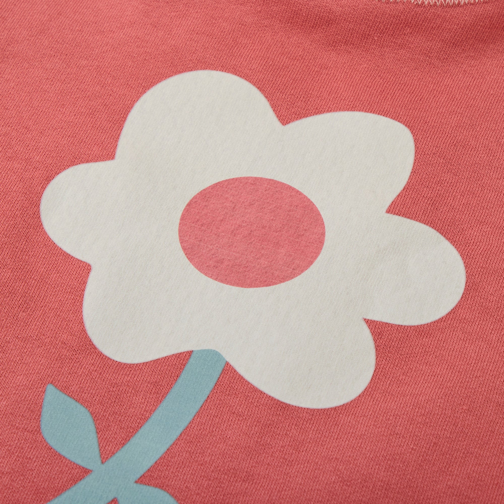 Red sweatshirt with a white flower from MIBONBON
