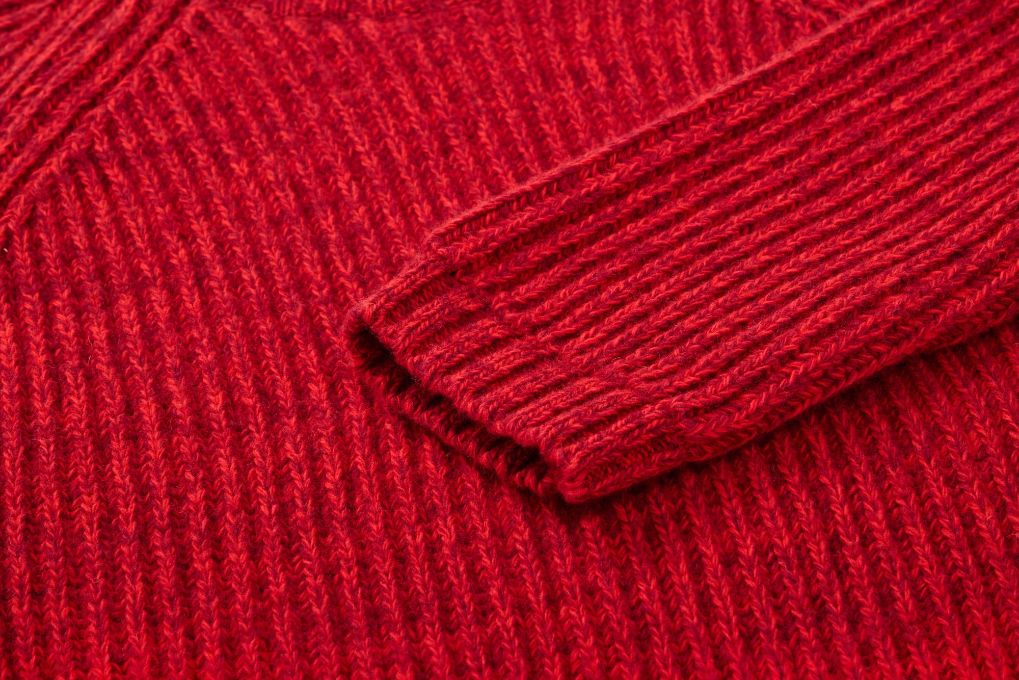 Red knitted sweater from MIBONBON