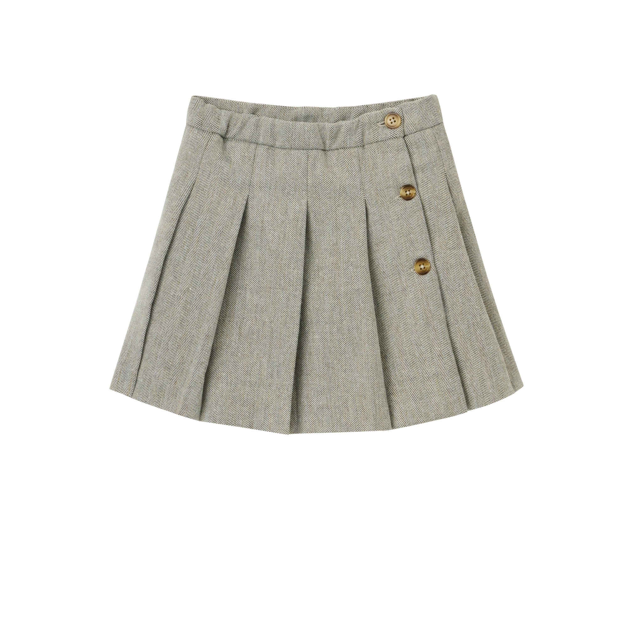 Gray pleated skirt with gold buttons on a white background