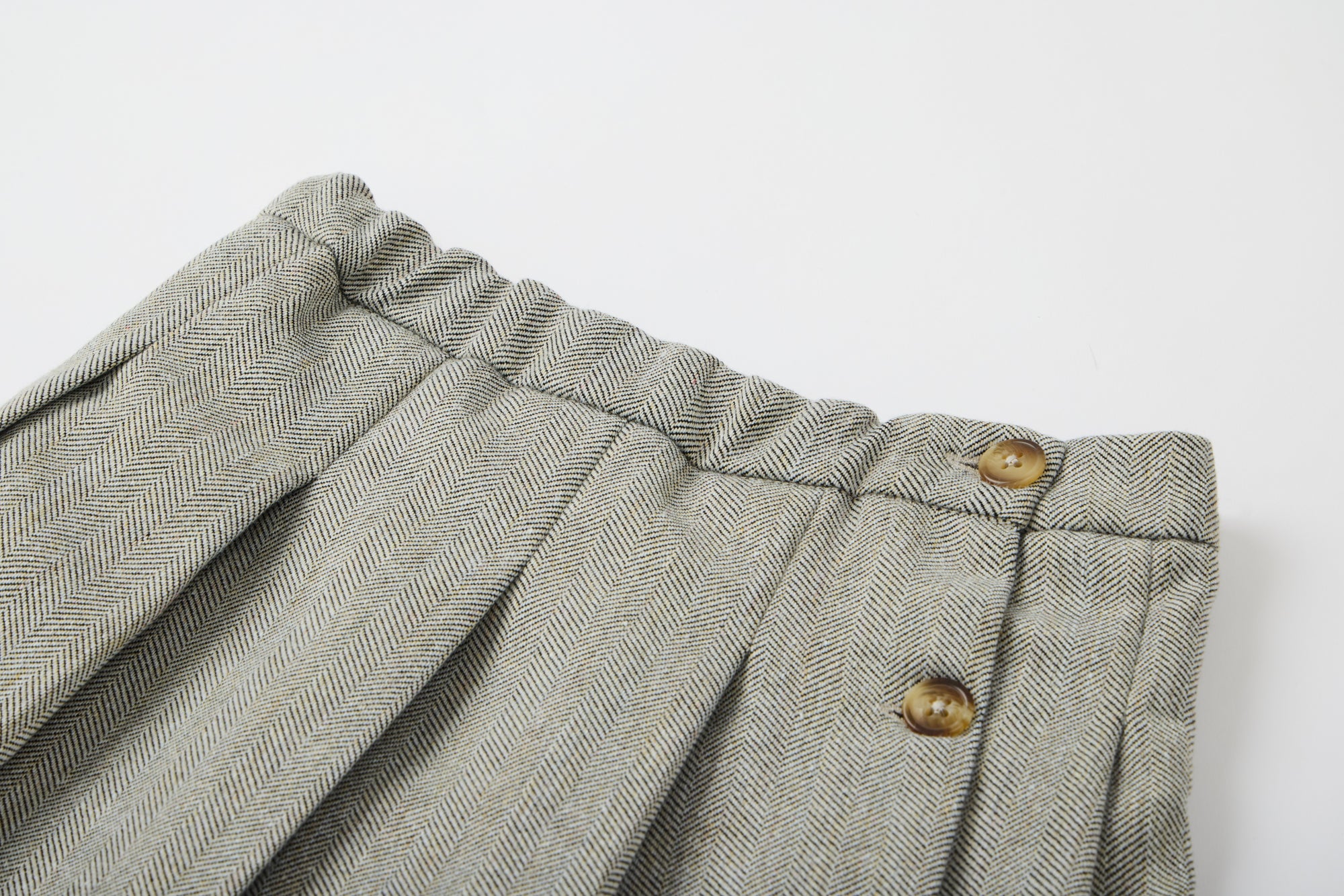 Grey  skirt with brown buttons