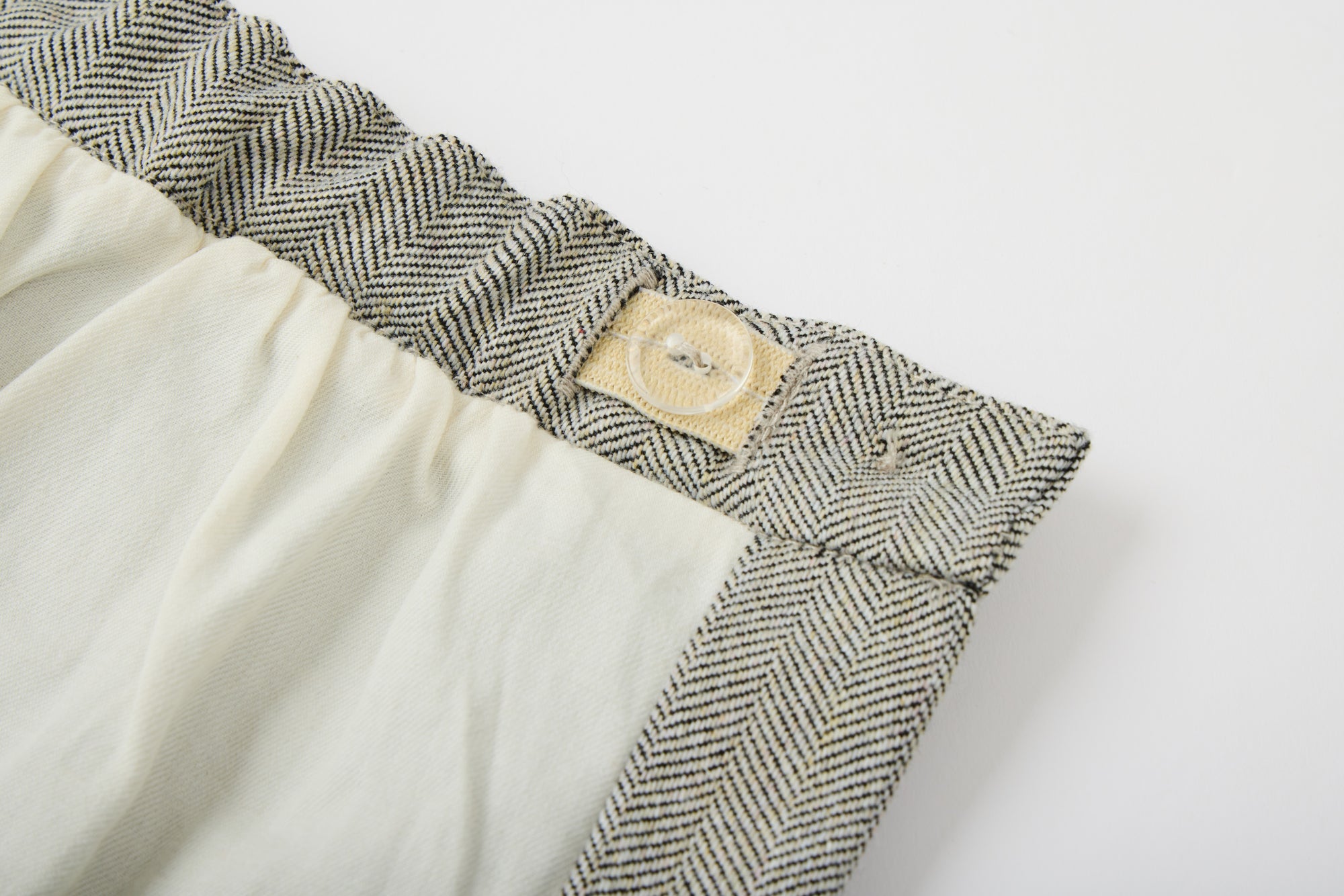 Grey  skirt with brown buttons