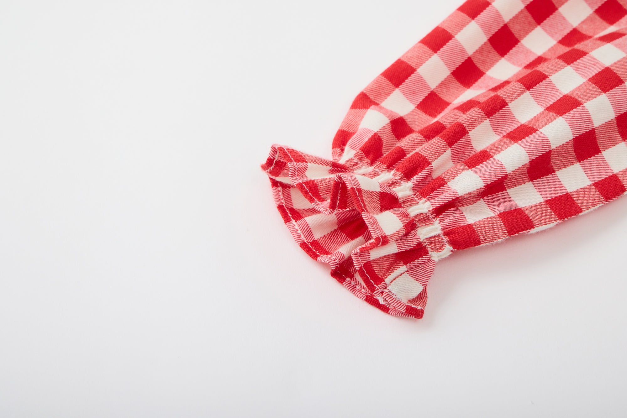 Red and white checkered blouse for babies