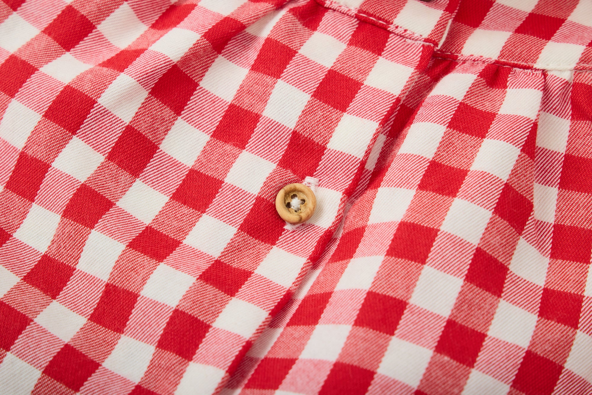 Red and white checkered blouse for babies