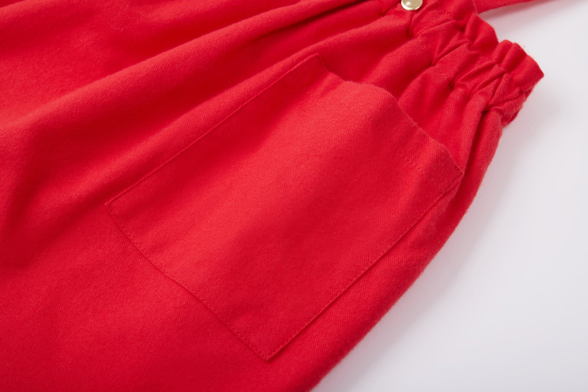 Red skirt with suspenders from MIBONBON